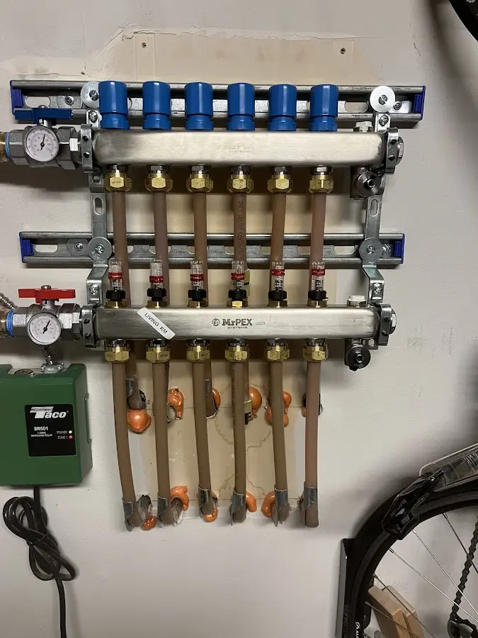 Plumber performing Gas Line Installation at a residential property in Holt